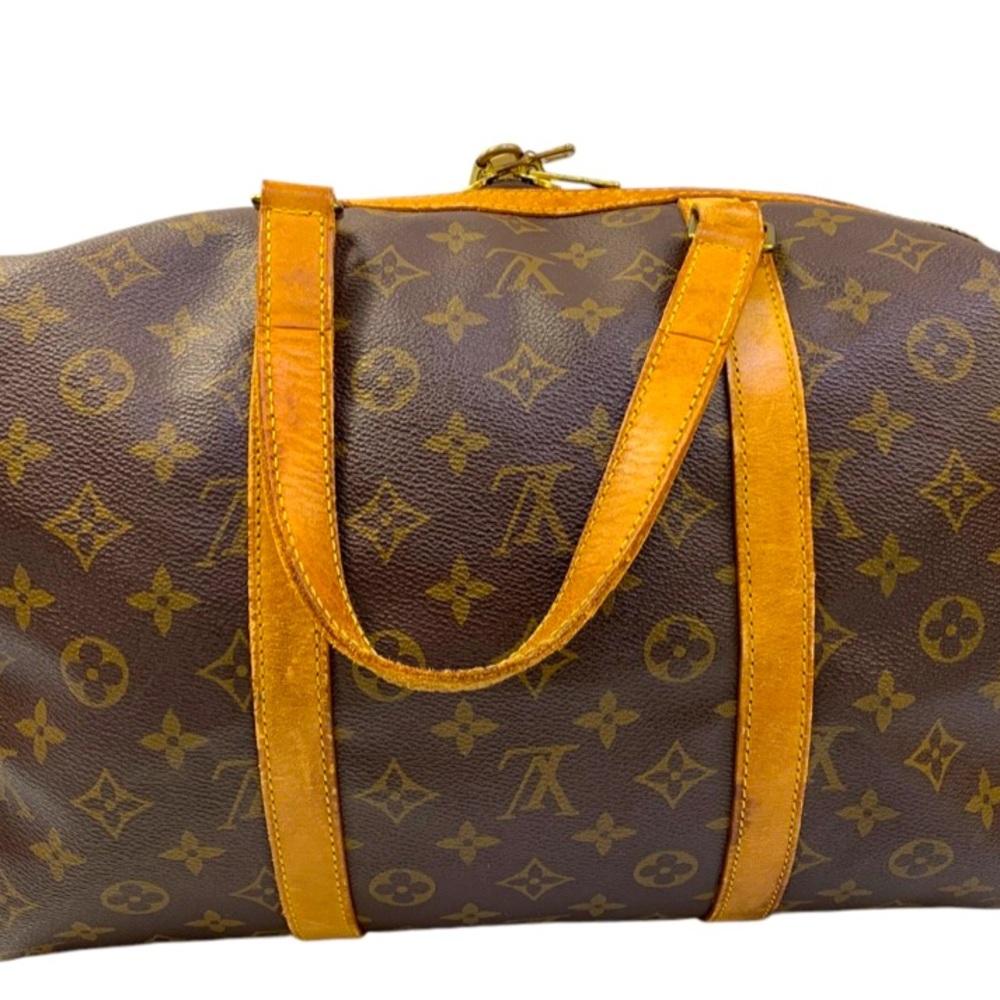 🥳!!! Louis Vuitton Sac Souple 35 leather bag.